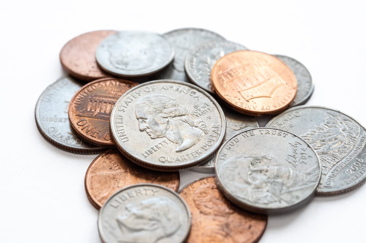 A pile of United States paper money and currency